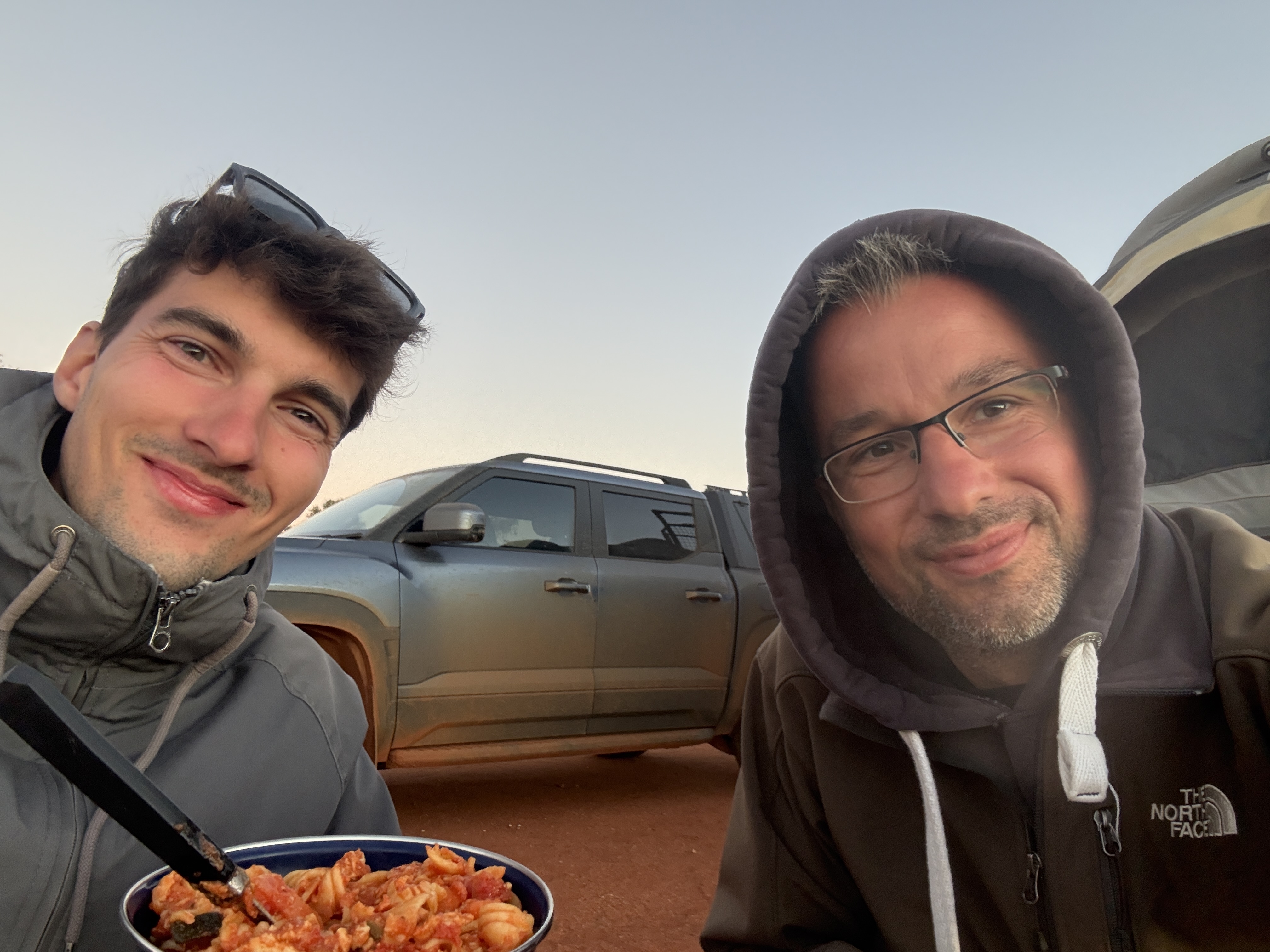 The PeakRunner founders at their outback campsite where coding began