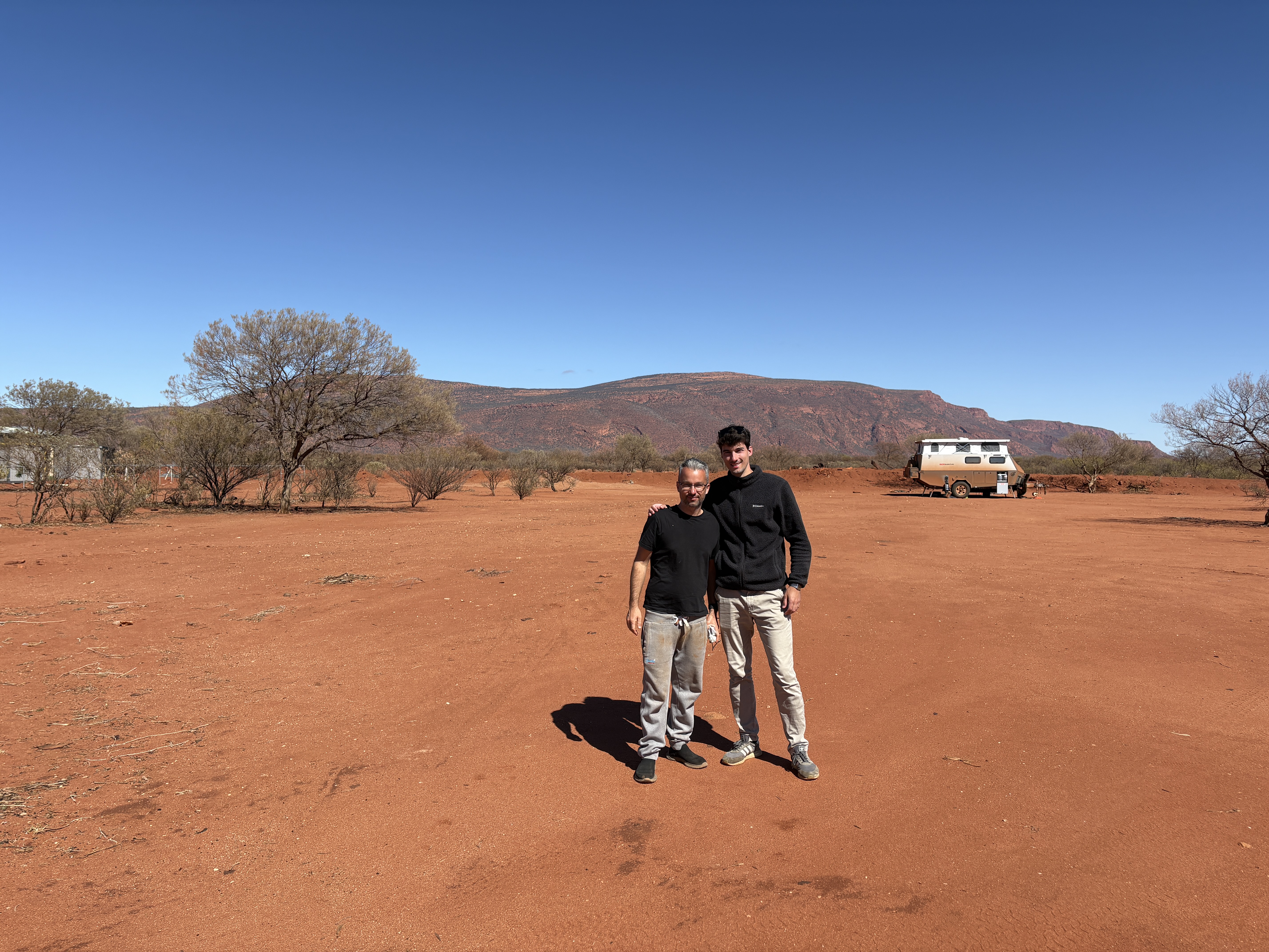 The two brothers in the Australian outback with Mount Augustus